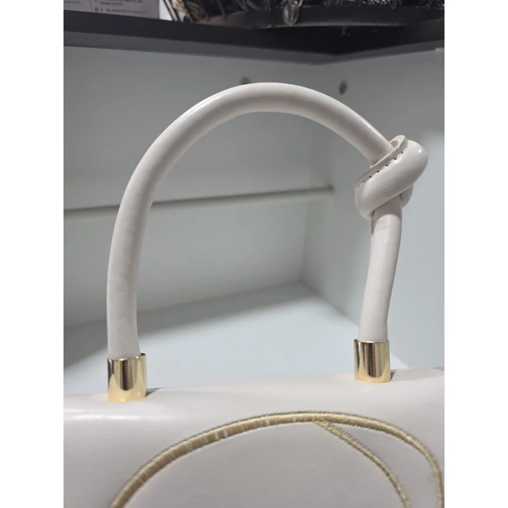 White Structured Top Handle Purse Gold Embroidered Abstract Face Chain Strap Bag